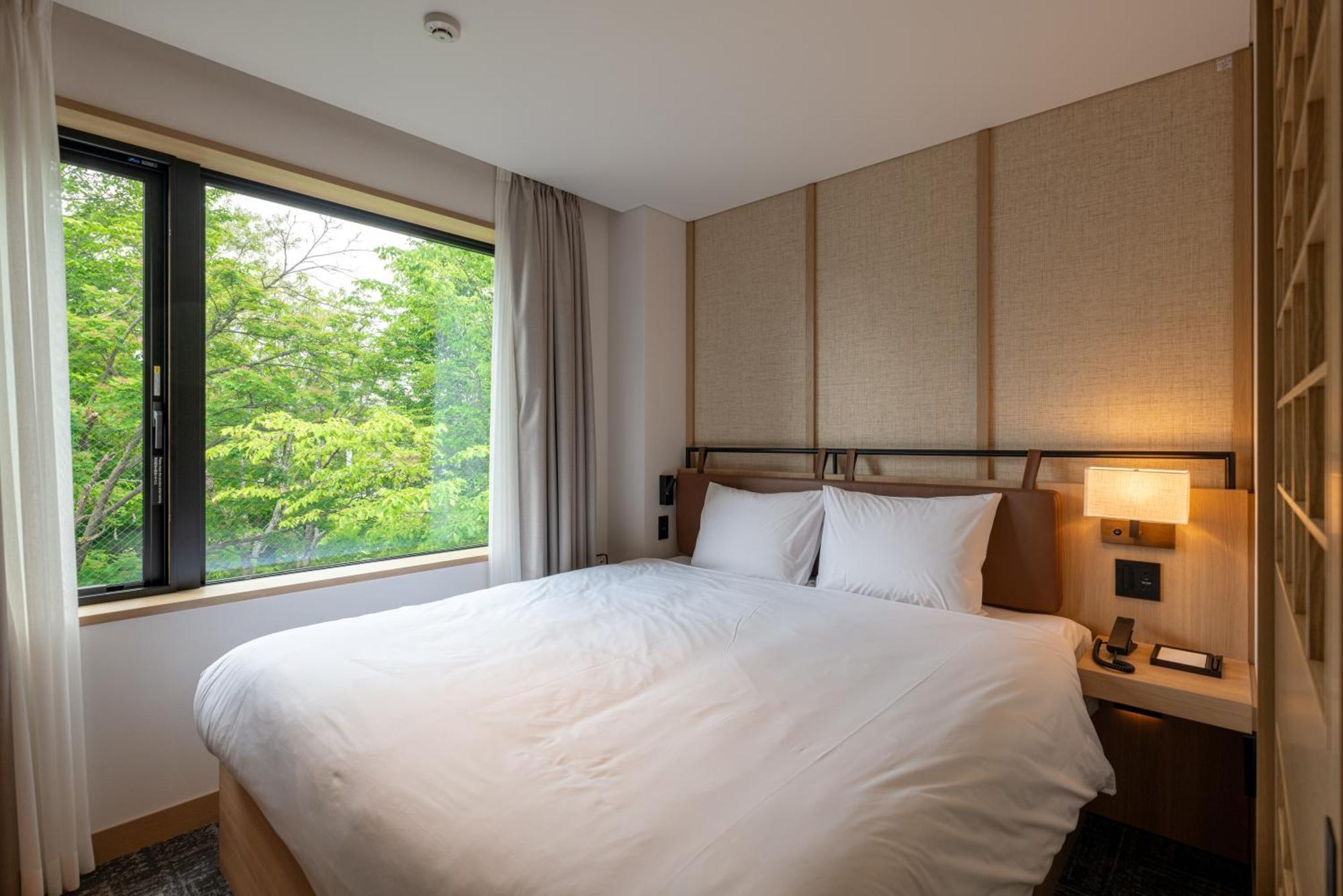 Nozo Hotel NakaNakafurano Buitenkant foto